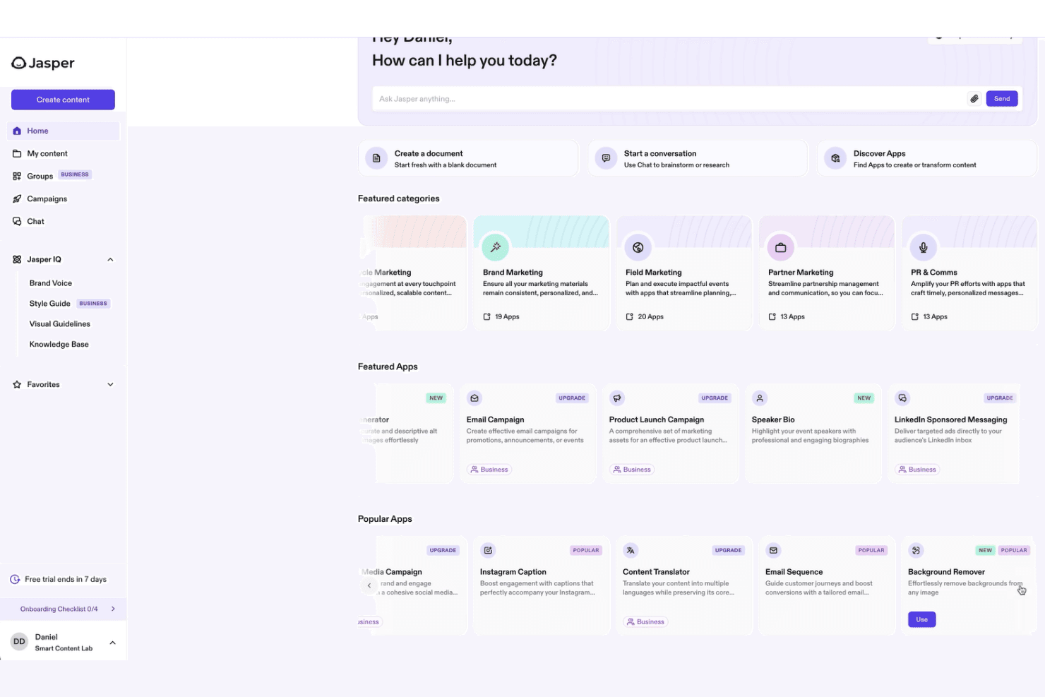 Jasper AI home dashboard showing featured categories, apps, and chat interface for content creation.