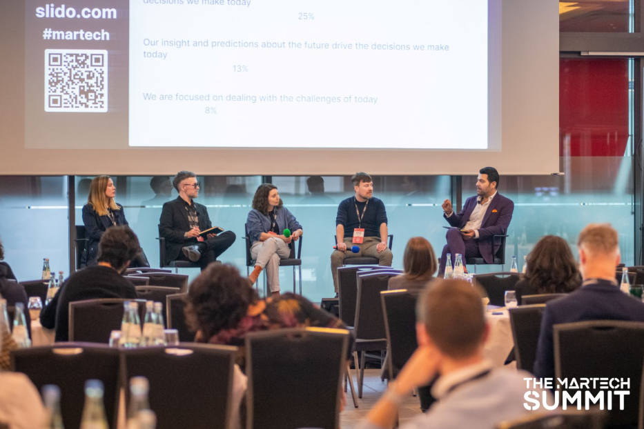 A photo of panelists and attendees at the Martech Summit.