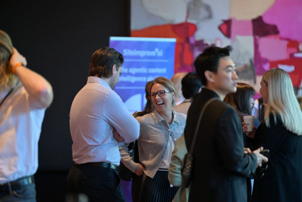 Attendees networking and chatting during the Marketing Leaders Summit