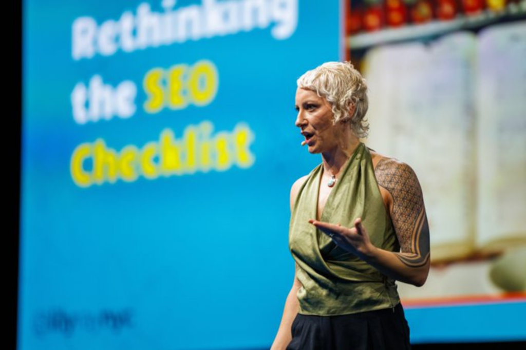 Speaker Lily Ray, Vice President, SEO Strategy &amp; Research at Amsive, on the MozCon 2025 stage