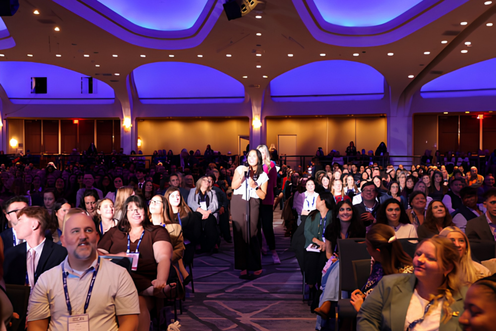 Conference attendees participating in a session at the PRSA ICON