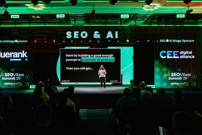 Conference attendees watching a presentation at SEO Vibes Summit