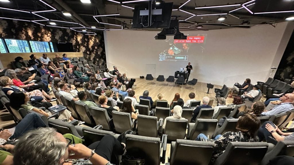 Attendees gathered for a presentation at the AANZCA Conference