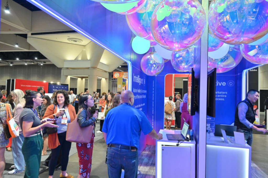 Exhibitors connecting with attendees at the CMW 2025 expo hall