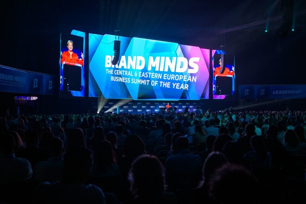 A speaker takes center stage at the Brand Minds conference.