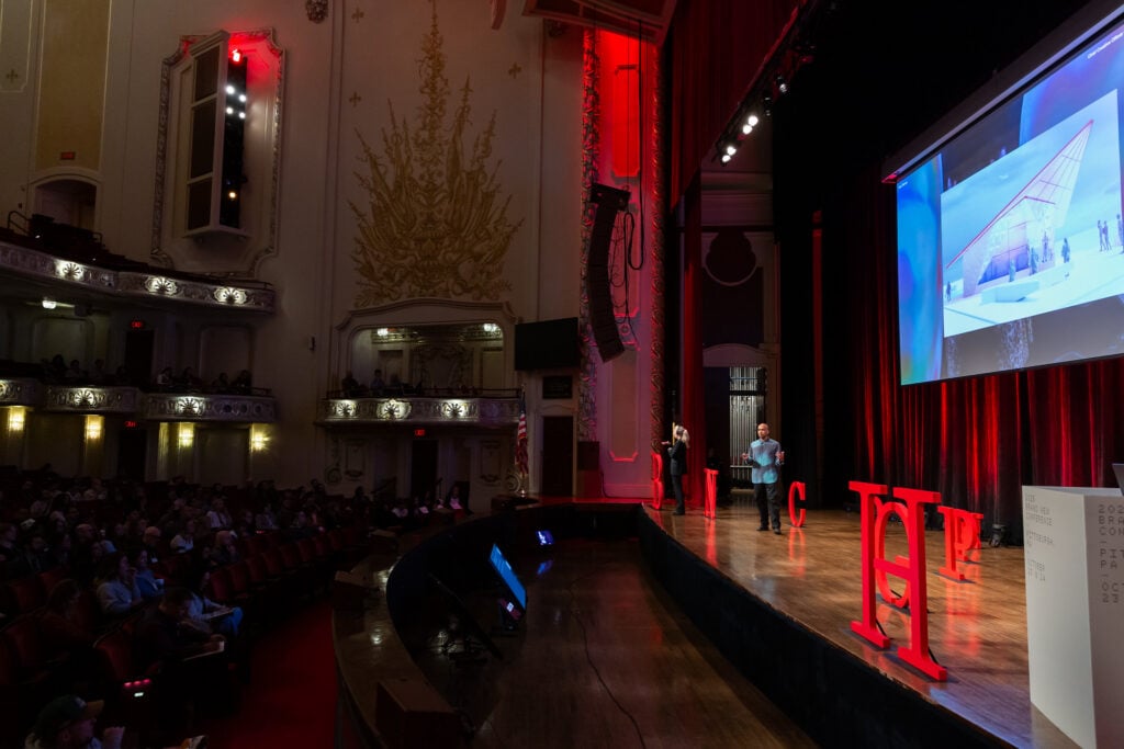 A speaker presentation at the Brand New Conference